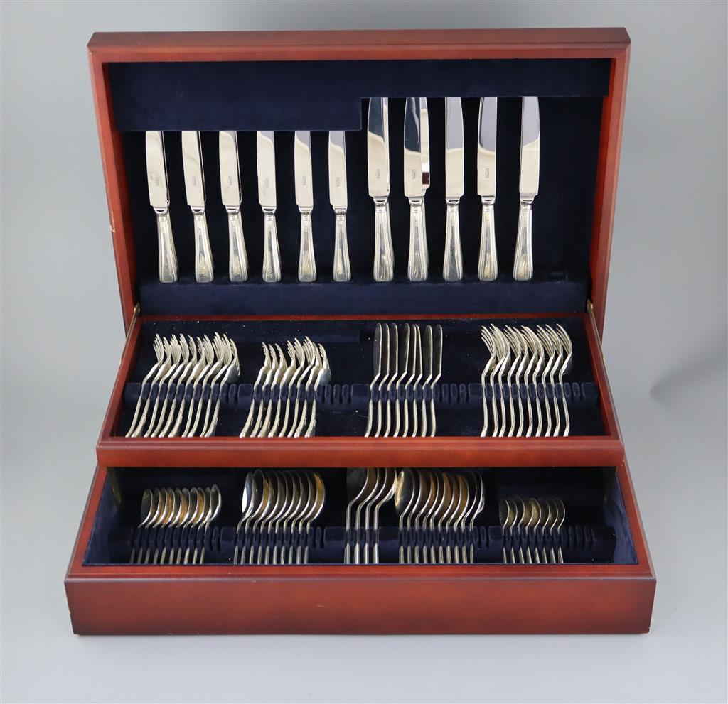 A modern part canteen of silver beaded Old English pattern flatware and cutlery, in mahogany case,